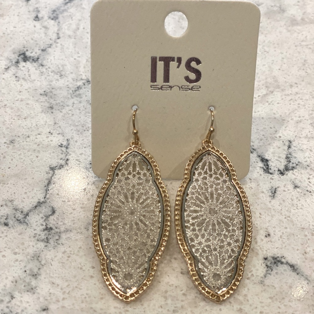 Silver and gold tone earrings